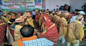 1. सामूहिक विवाह का आयोजन करना ।